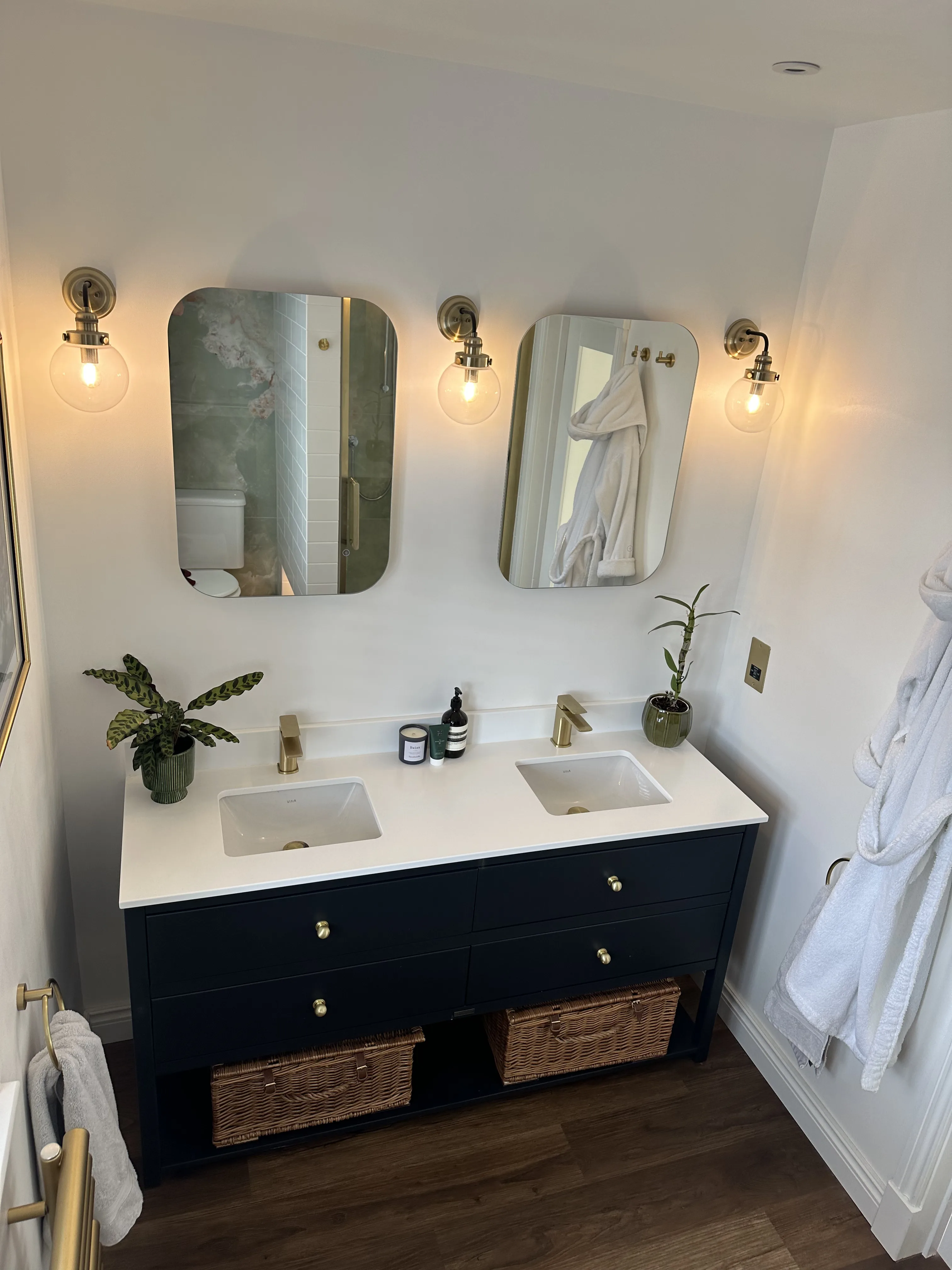 Double vanity unit and basins in a completed bathroom