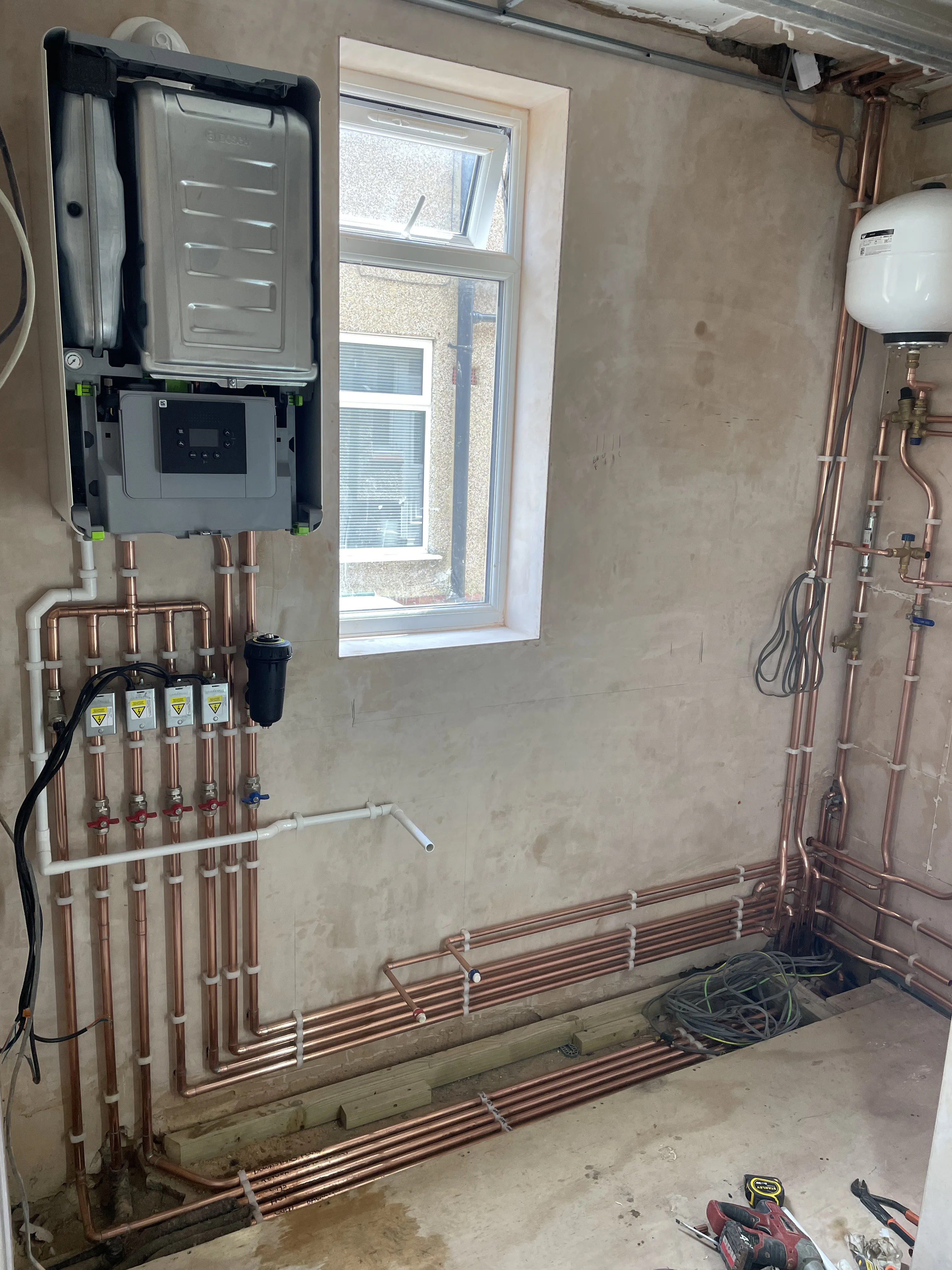 Neat copper pipework installation by Great Scott Plumbing