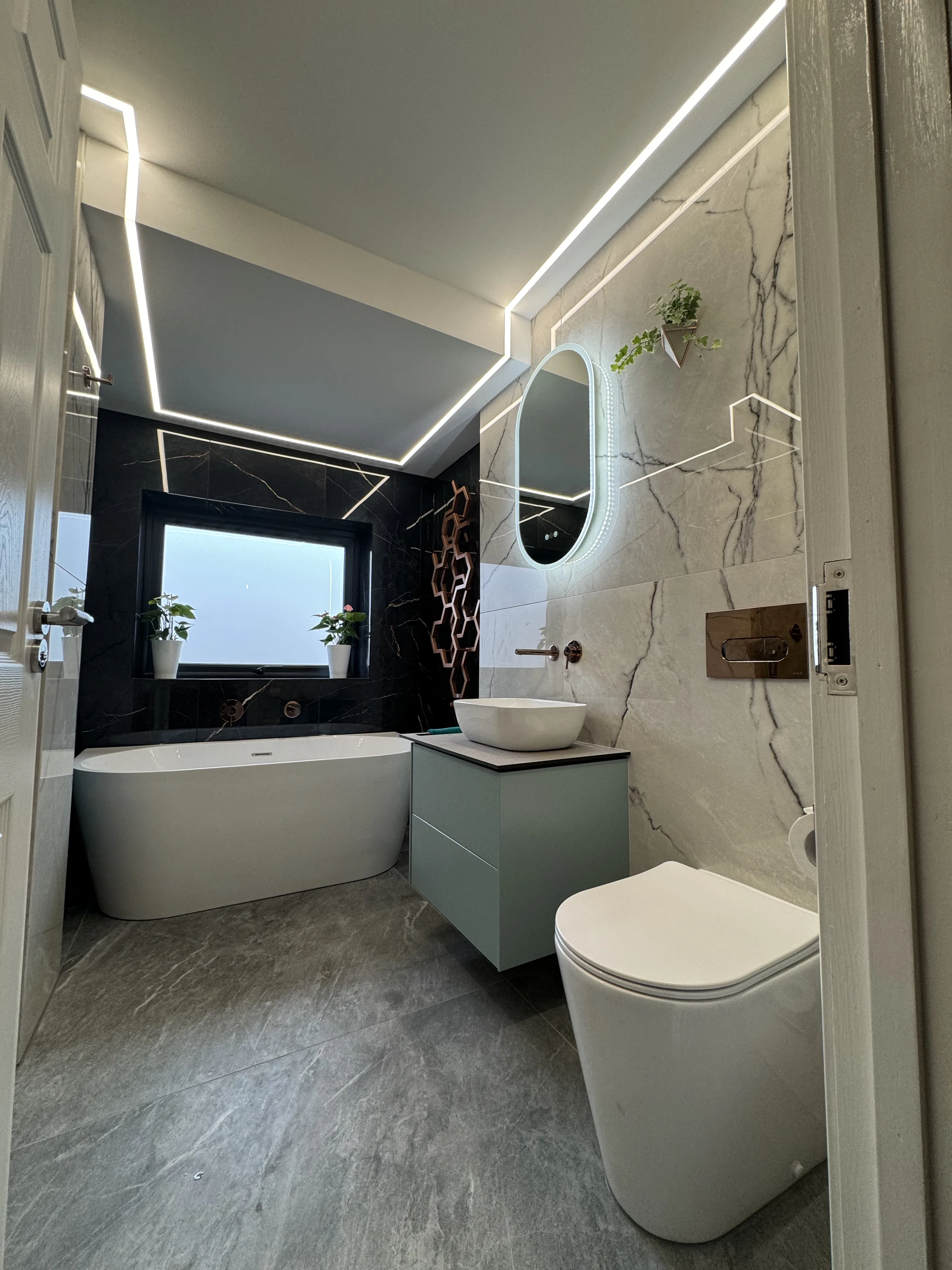 Modern bathroom installation with new suite